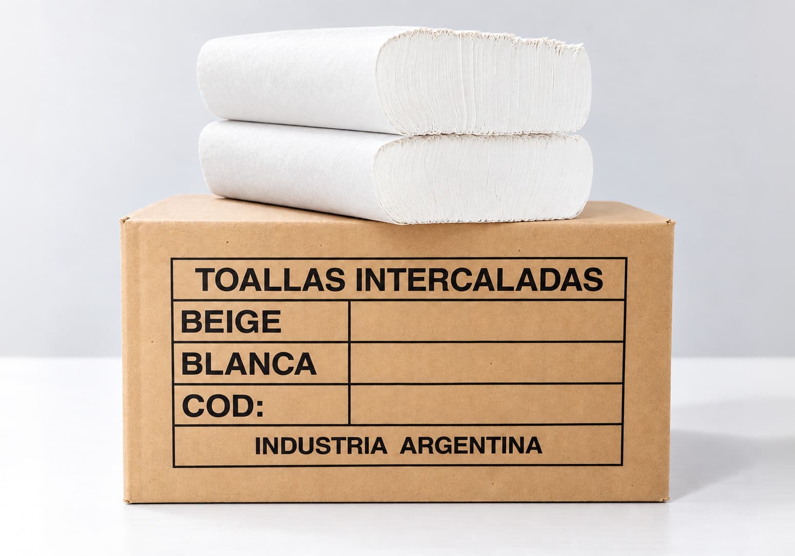 Toallas intercaladas blancas premium sobre su caja